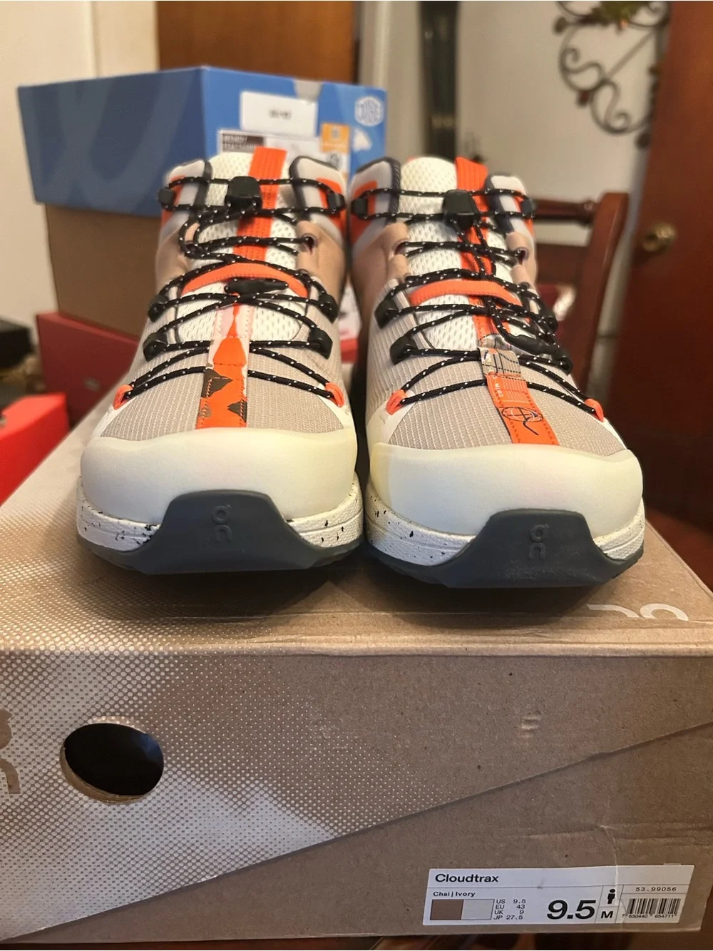 Men’s On Cloudtrax Shoes in Chalk/Ivory with Orange Accents